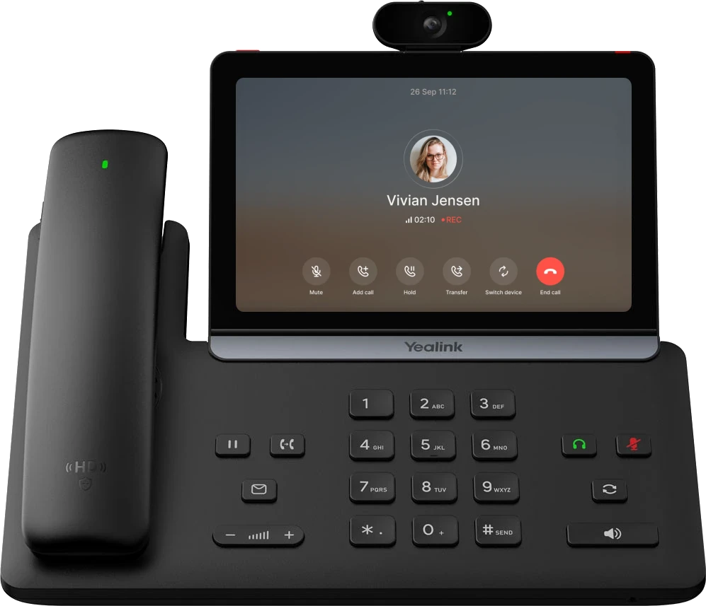 Olatti running on the Yealink T88W Pro, the flagship smart desk phone with a video camera, on a call with Vivian Jensen